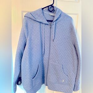 Women’s 1X quilted sweatshirt.  True color is a light denim blue